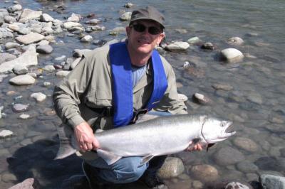 Tom Stejskal poses with a chrome silver-sided Chinook (King) Salmon
